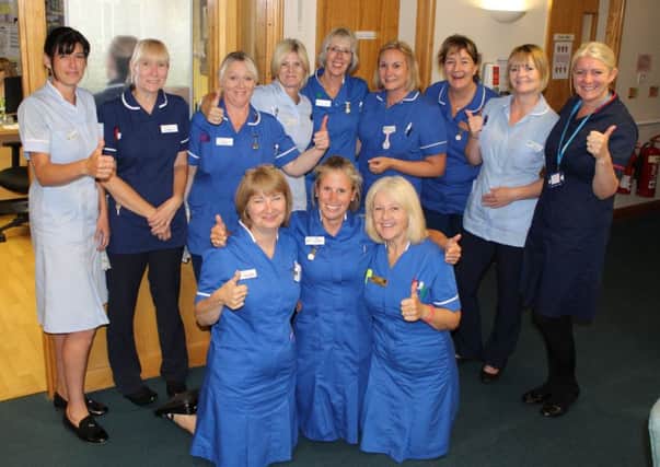 Nurses at the Rowans Hospice celebrate the inspection report