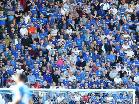 Pompey fans watch the season opener against Rochdale
Picture: Joe Pepler