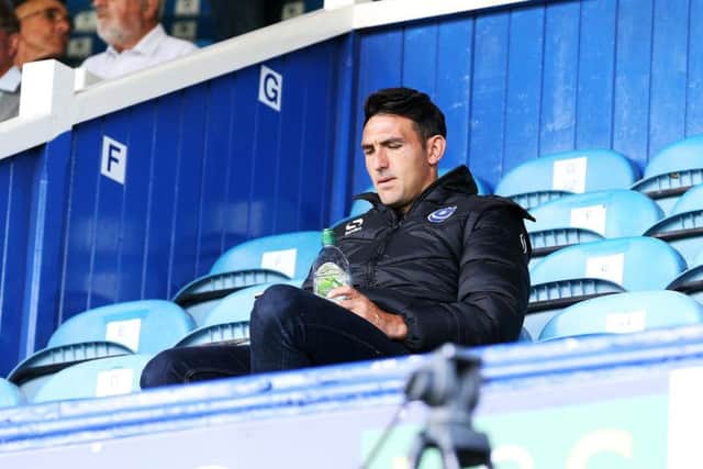Gary Roberts watched Saturday's win over Rochdale from the stands.