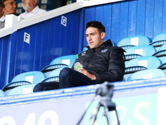 Gary Roberts watched Saturday's win over Rochdale from the stands.