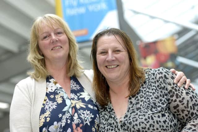 Mary Bearpark, left, and her sister Diane Whitcombe  meet for the first time Picture: Ross Lucas-Young
