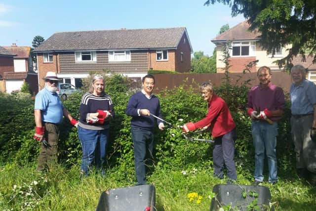Alan Mak MP at the New Lane Cemetery with the Friends of Havant Cemeteries