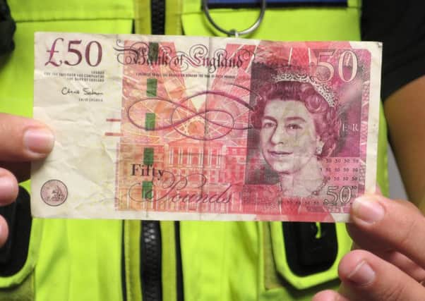 Counterfeit Â£50 notes seized by police in Portsmouth