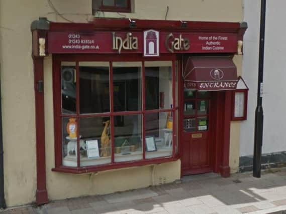 A Portsmouth-based takeaway director has been fined and banned for employing an illegal worker
