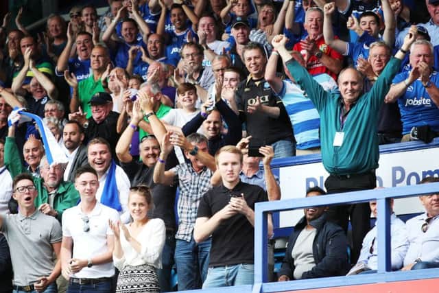 Pompey fans celebrate against Rochdale. Picture: Joe Pepler