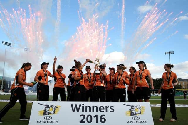 Southern Vipers Charlotte Edwards celebrates with the trophy and team-mates after the winning in the final during the Kia Women's Super League Finals Day at the County Cricket Ground, Chelmsford last season