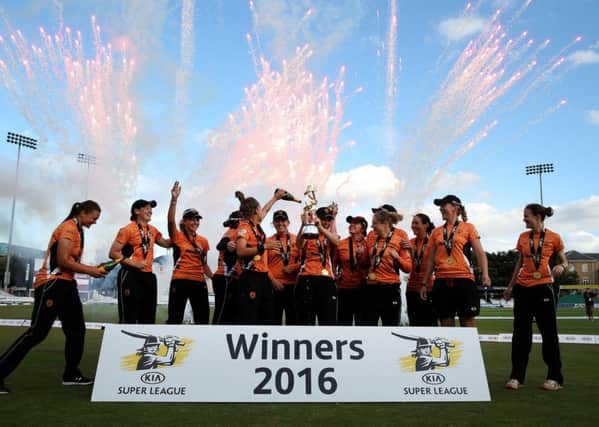 Southern Vipers Charlotte Edwards celebrates with the trophy and team-mates after the winning in the final during the Kia Women's Super League Finals Day at the County Cricket Ground, Chelmsford last season