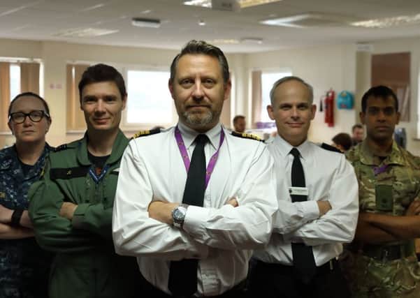 (left to right) CWO3 Jennifer Olson, US Navy, Wing Commander John Cockroft, RAF, Captain Andrew Stacey, RN, Commander Simon Chapman, RN and Major Rik Karadia, RA. Picture: Richard White/MOD/PA