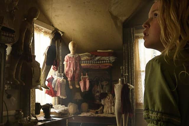 Talitha Bateman as Janice.