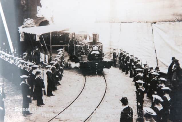 An especially-adapted train for royalty arriving in the dockyard for the launch of HMS Dreadnought in 1906.