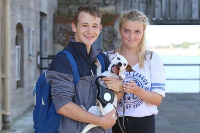 Ben Barrett and Ashleigh Kendell with Cody Picture: Habibur Rahman