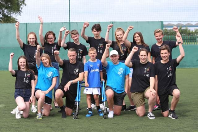 Charlie Smith, 10, with the NCS team Picture: Habibur Rahman