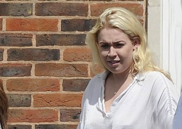 Emily Potter leaves Portsmouth Magistrates' Court after admitting drink-driving 
(170937-1)