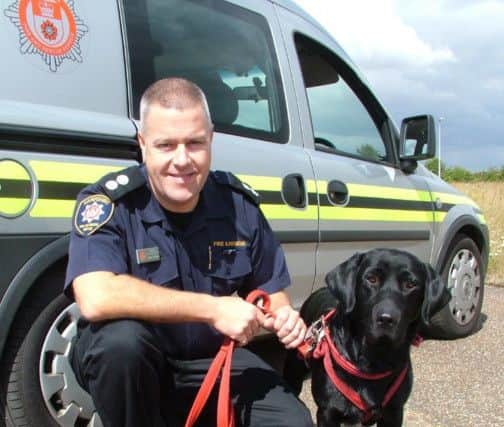 Saxon, right, and handler Graham Howlett