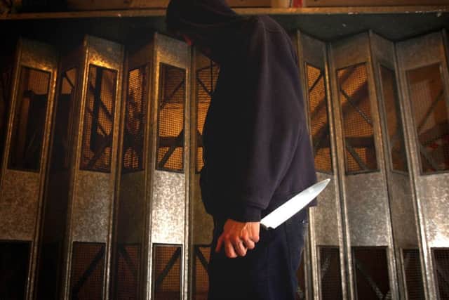 Young people in gangs are becoming desensitised to knife crime. Photo posed by a model IMAGE: Katie Collins/PA Wire B2180101247155319A