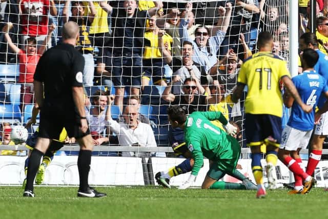 A mistake from keeper Luke McGee led to Oxford's opening goal Picture: Joe Pepler