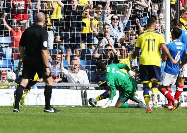 A mistake from keeper Luke McGee led to Oxford's opening goal Picture: Joe Pepler