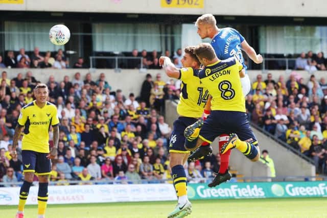 Pompey's Jack Whatmough heads at goal against Oxford United. Picture: Joe Pepler/Digital South.