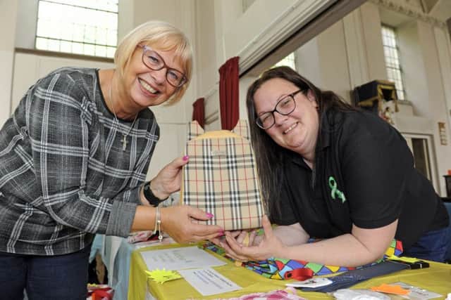 A fundraising event was held at St Michael's and All Angels Church in Paulsgrove. From left, Penny Golding and Thomas Burrage's mum, Emma Burrage.
Picture Ian Hargreaves (170949-1) PPP-171208-172438006