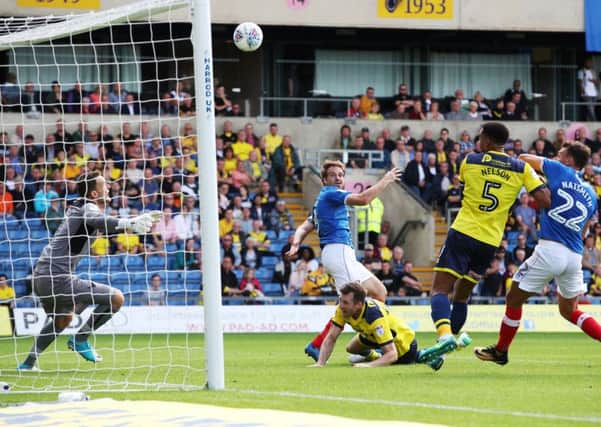 Brett Pitman heads home, only for the goal to be disallowed. Picture: Joe Pepler