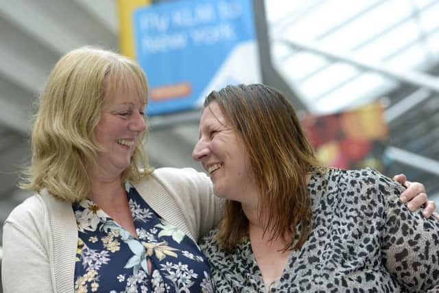 Mary Bearpark, left, and her sister Diane Whitcombe meet for the first time Picture: Ross Lucas-Young
