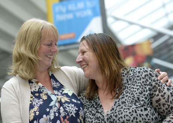 Mary Bearpark, left, and her sister Diane Whitcombe meet for the first time Picture: Ross Lucas-Young