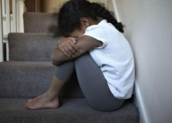 Action for Children says up to 140,000 youngsters don't meet the threshold for social care and are not referred to early help after their case is closed. Picture: PA