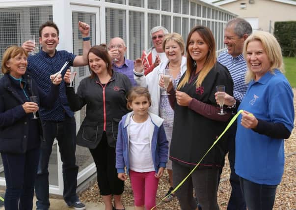 Visitors and staff celebrate the opening of the Muirburn Kennels and Cattery.
Picture by Habibur Rahman