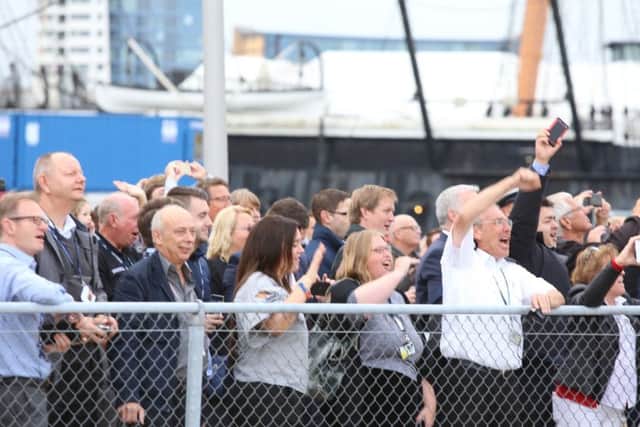 Crowds in the dockyard welcome HMS Queen Elizabeth to Portsmouth for the first timePicture: Habibur Rahman
