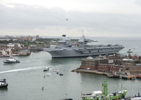 HMS Queen Elizabeth arrives in her home port of Portsmouth Harbour for the first time Picture: Steve Reid/Blitz Photography