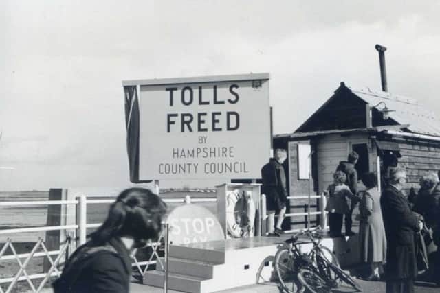 April 11, 1960, and the Stop and Pay sign is put away on Hayling bridge.