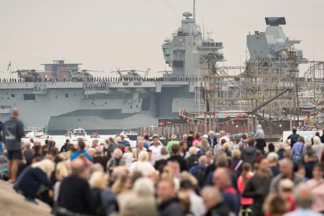 Crowds greet HMS Queen Elizabeth