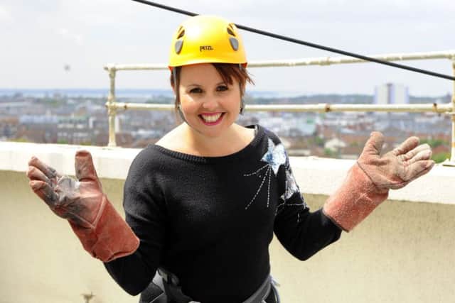 PETRIFIED Anxious Cheryl before her 2013 abseil