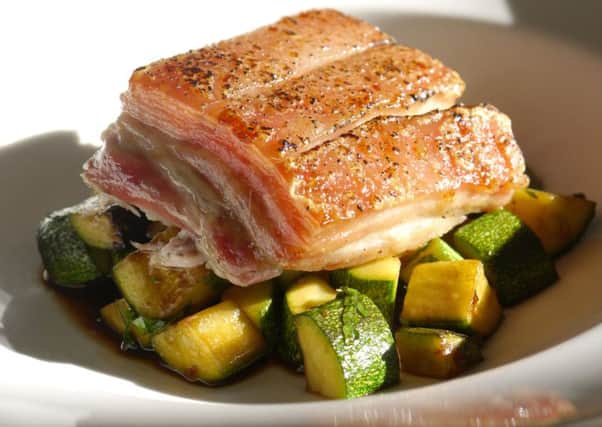 Serving your courgettes with pork belly makes for a hearty main dish