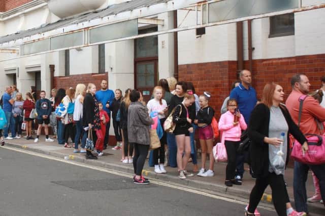 Youngsters queue at the Kings to audition for a previous production, Cinderella