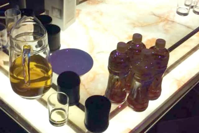 Whisky bottles and glasses spotted in a hidden karaoke area at Melody in Commercial Road, Portsmouth