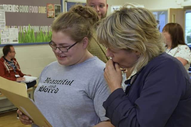 Daniela Bamber-Widdowson discusses her results with maths teacher Nicola Waters

 at St Vincent College in Gosport Picture: Neil Marshall (171028-17)