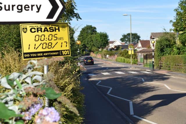 A board put up by police after the crash