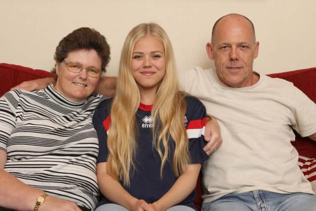 Transplant Games swimmer Nicole Mackenzie with her mum Julie and dad, David, who gave her one of his kidneys