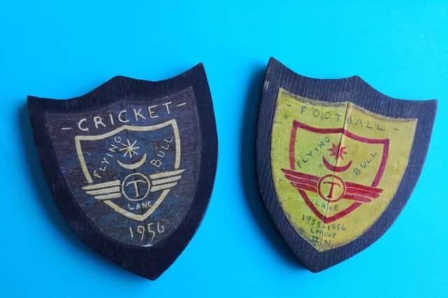 Brian Warehams treasured shields from Flying Bull Lane School.