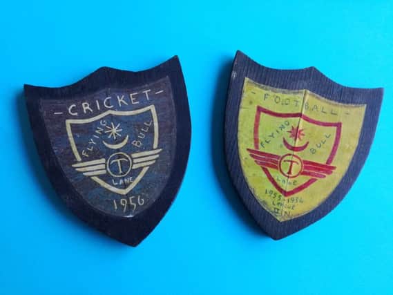 Brian Warehams treasured shields from Flying Bull Lane School.