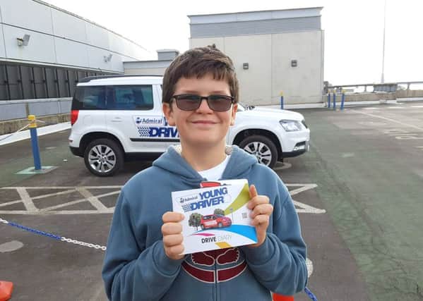 Young Driver

Daniel Roper, age 11, at his first Young Driver lesson