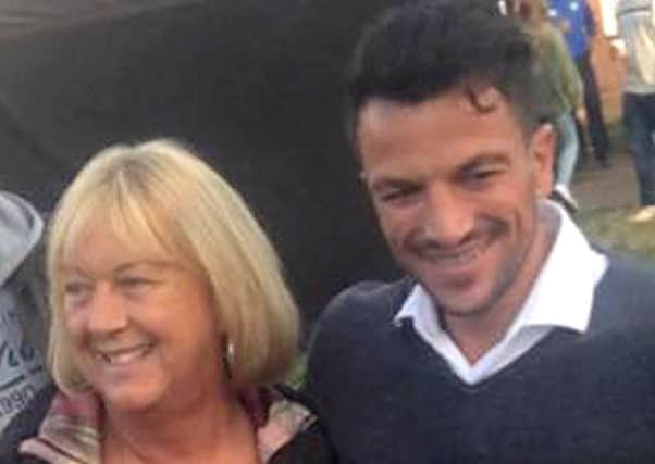 Peter Andre with a fan in Stubbington