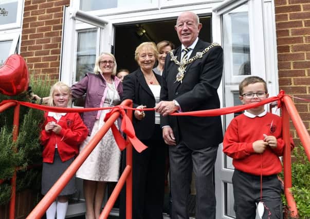 The Lord Mayor Councillor Ken Ellcome cuts the ribbon. Pictured from left, is Sophia Ball, headteacher Sarah Sadler, Sue Samson, the chief executive of the University of Chichester Academy Trust, Cllr Ken Ellcombe and Jack Cooper        (171147-8)