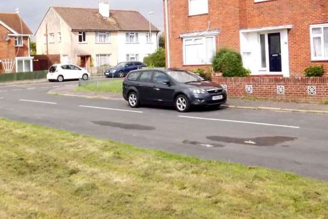 NOW: The same location today. The boys were playing on the base of the new road, Norley Close.