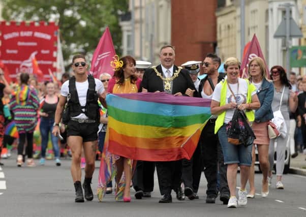 Last year's Portsmouth Pride march makes its way to Southsea Common, led by Lord Mayor David Fuller.
 Picture: Mick Young