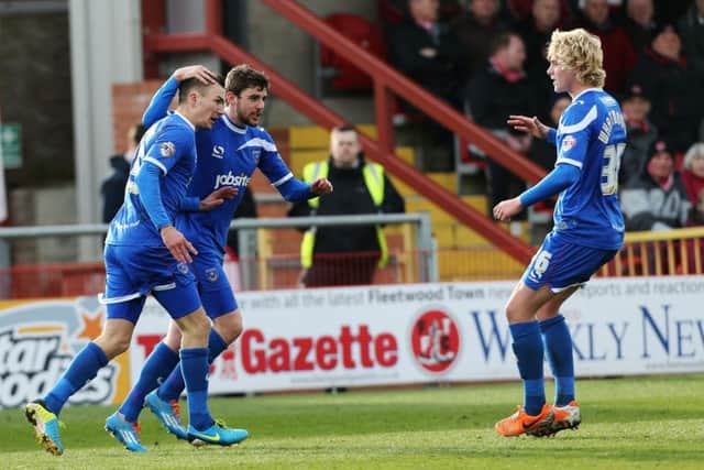 Jack Whatmough, right, goes to congratulate Jed Wallace following his goal at Highbury in March 2015