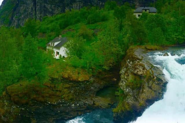Azura docked in picturesque Geiranger.