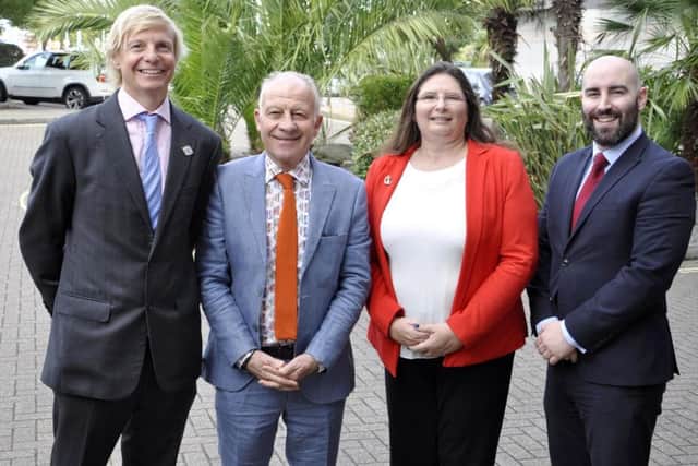 Desert Orchid jockey Colin Brown, second left, is welcomed by Maureen Frost, Hampshire Chamber chief executive, for the chamber's annual Southampton Boat Show lunch. With them at the city's Grand Harbour Hotel  are business development specialists Rory Renwick, left, from Ascot Racecourse and Chris Smith from facilities management company Norse.