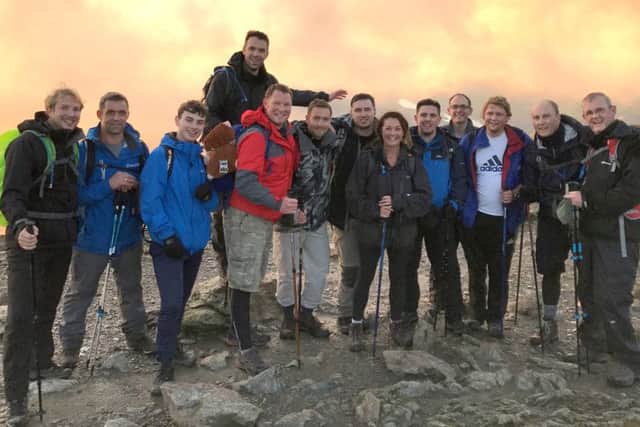 Staff from Taylor Made Computer Solutions at the top of Snowdon